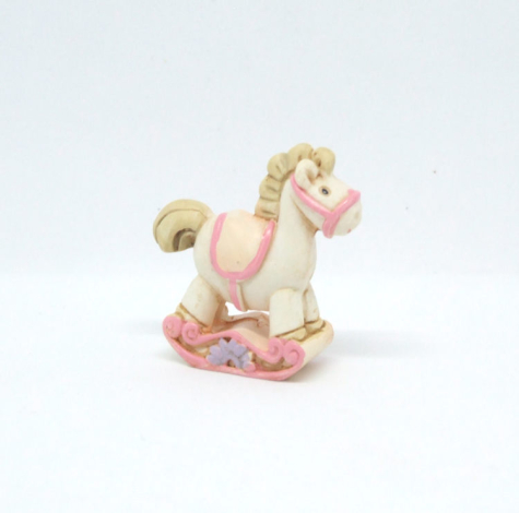 Dekofigur Schaukelpferd rosa