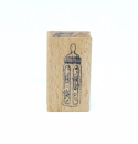 Holzstempel mit dem Motiv einer Babyflasche